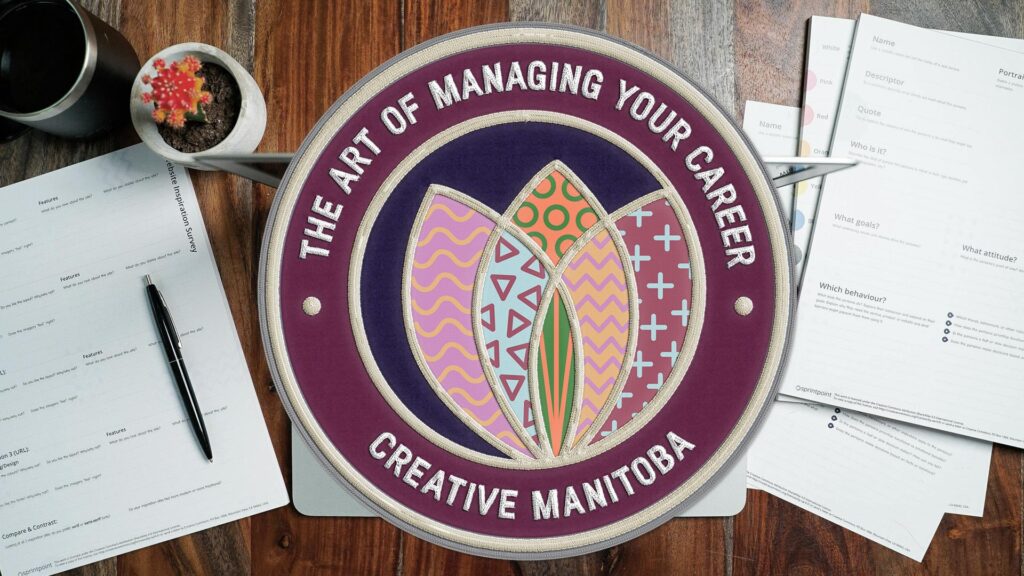 embroidered patch on desktop with papers
