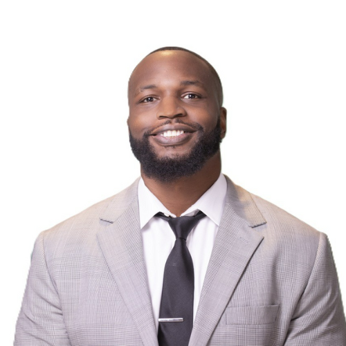man smiling in front of a white background